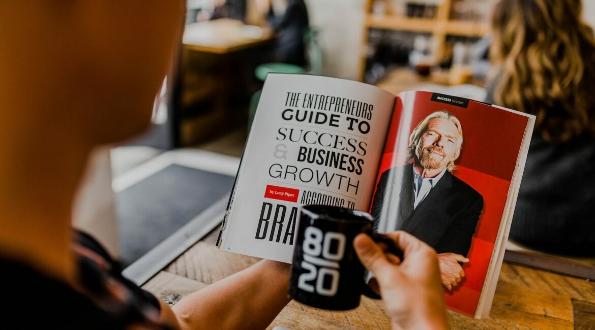 man reading magazine