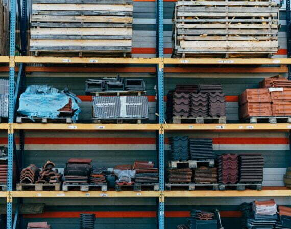 a shelf filled with lots of different types of bricks